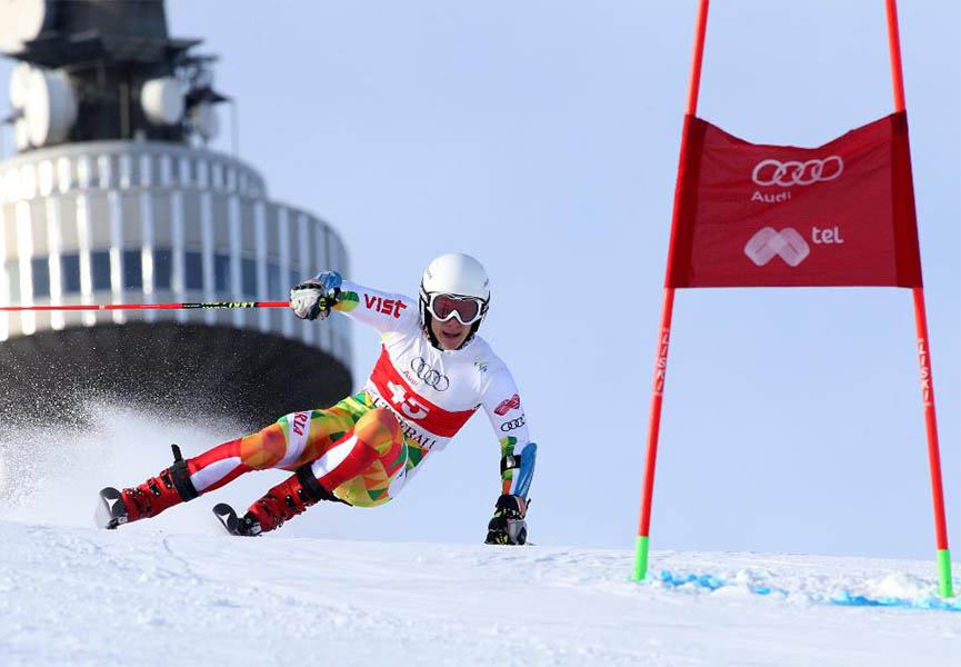 Skier descends at high speed on a freeride slope