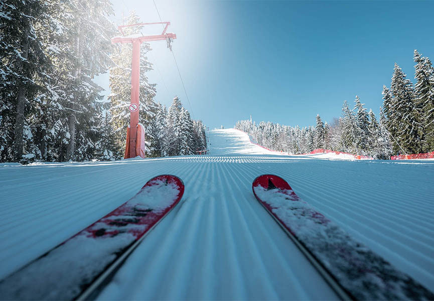 Pair of skis on a fresh slope