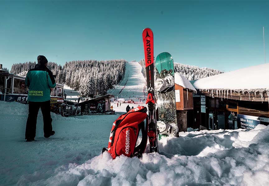 The skier looks at the descent