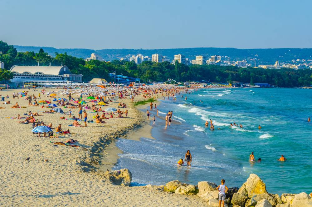 People relaxing on a sandy Black Sea beach in Bulgaria