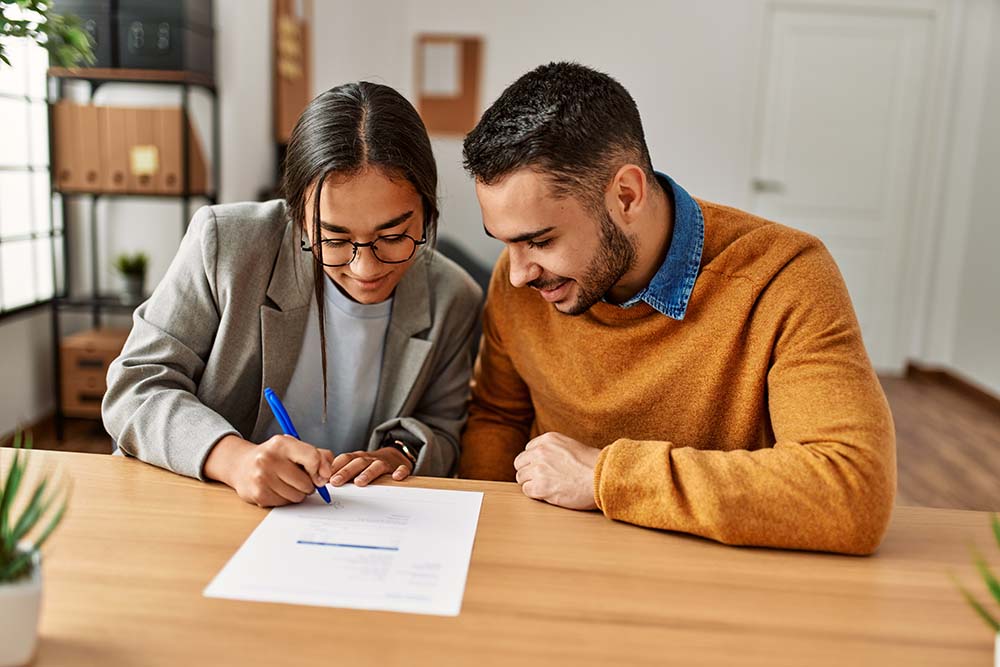 Planning property sale with tax exemption benefits Finnish couple planning property sale strategy reviewing ca...pital gains tax exemption documents for different property types